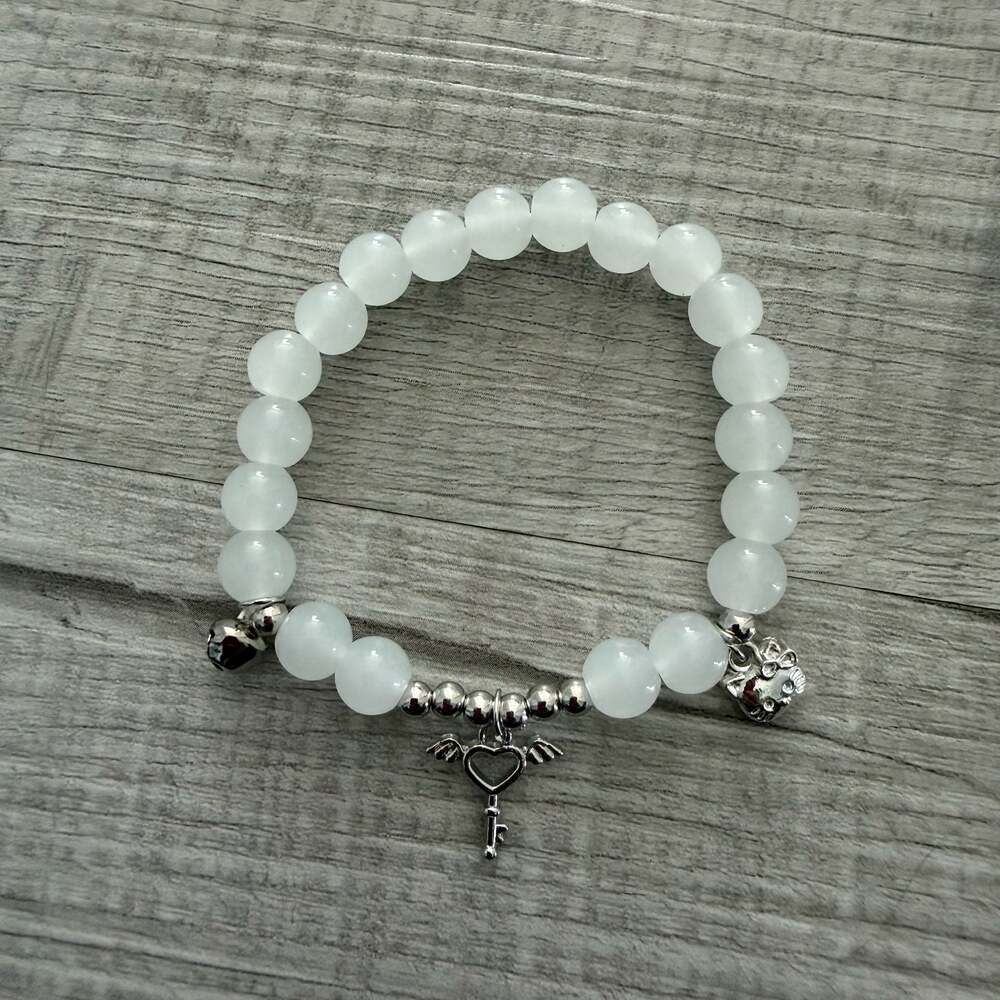Hello Kitty White Bead Elastic Stretch Charm Bracelet with Winged Heart Key